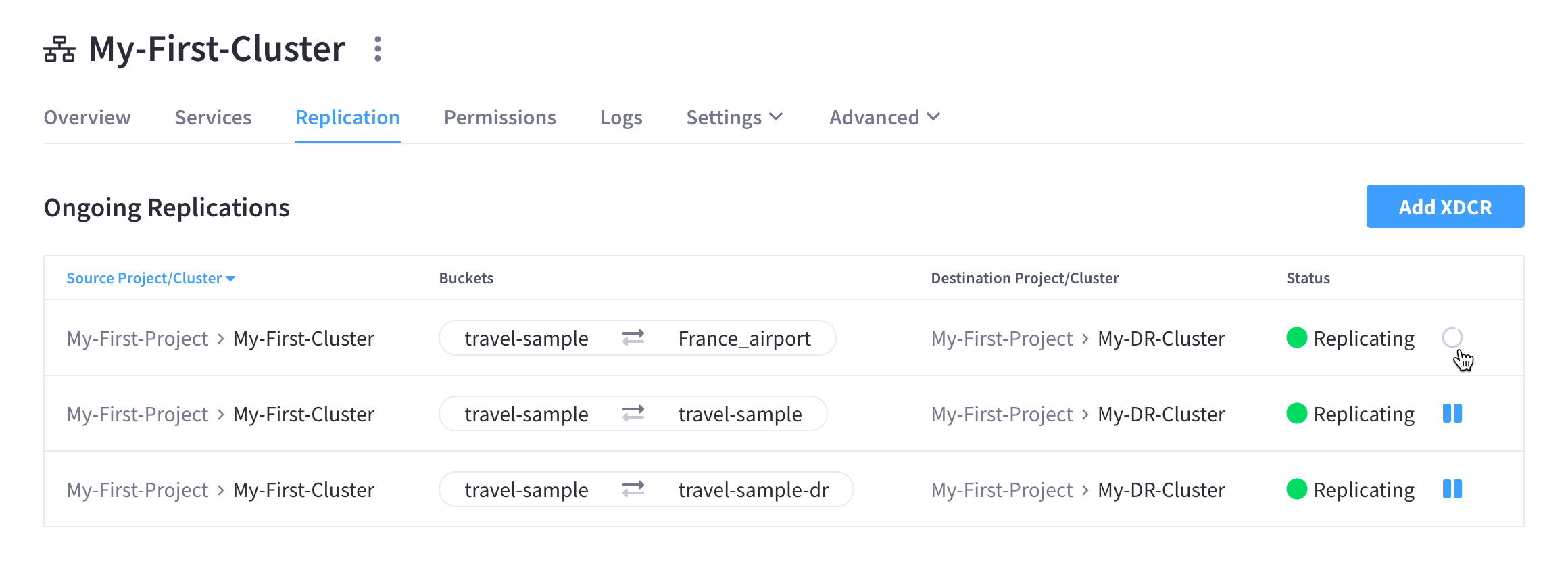 The source cluster’s 'Replication' tab showing a replication in the process of pausing.