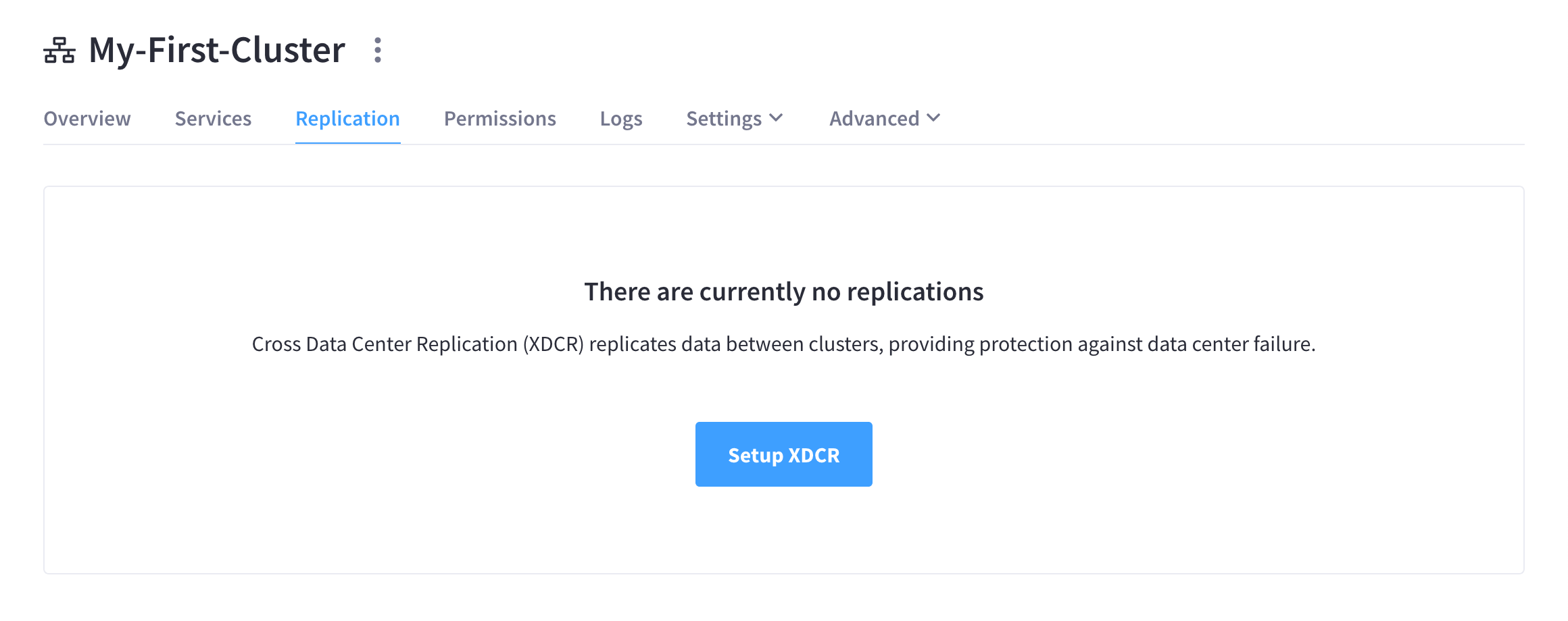 The source cluster’s 'Replication' tab showing a 'Setup XDCR' button.